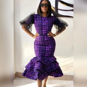 Long purple and black mermaid dress with puffy sleeves
